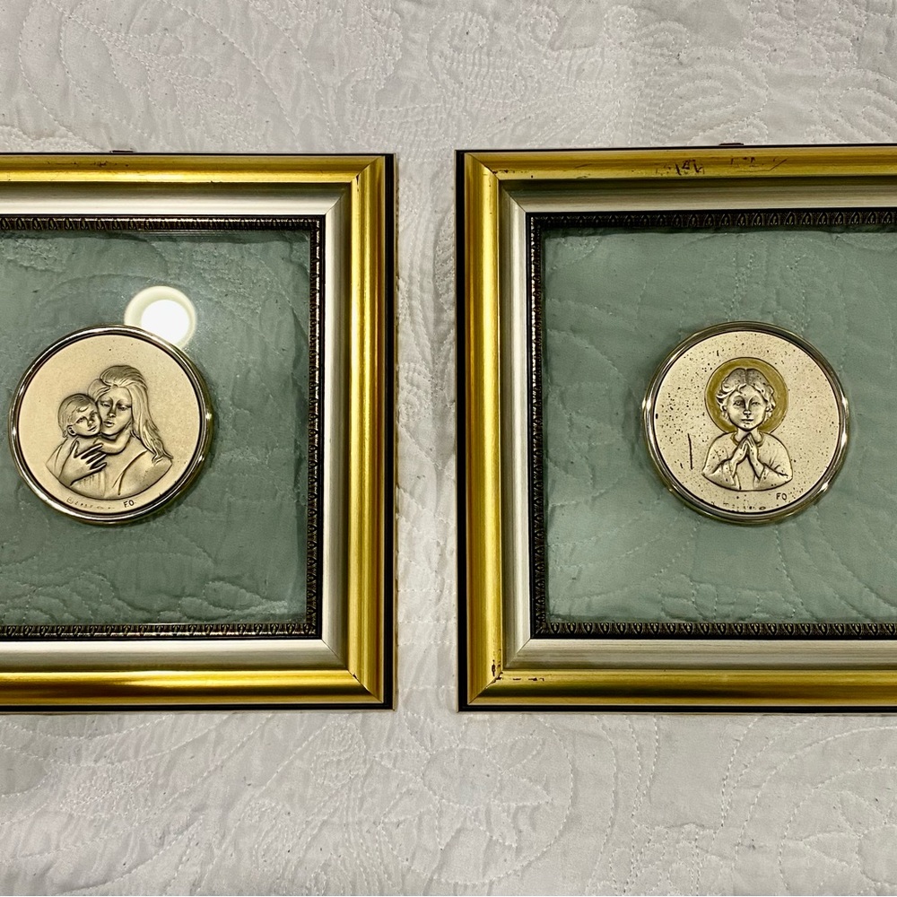 Vintage decorative work of art Madonna with child and angel.